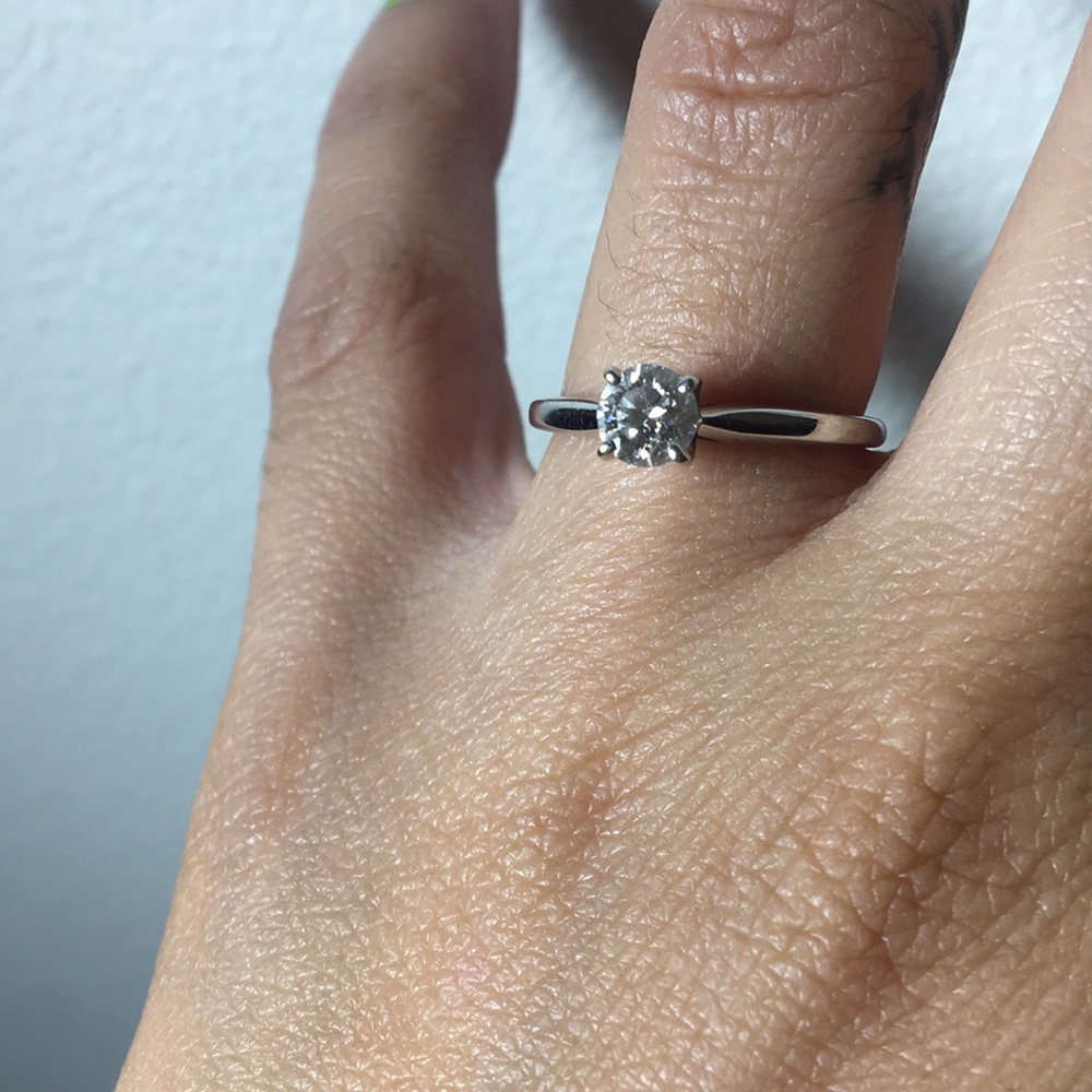 14 k white gold diamond ring.